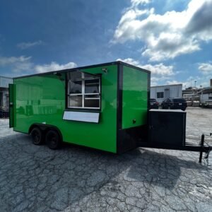 a green trailer with a black door