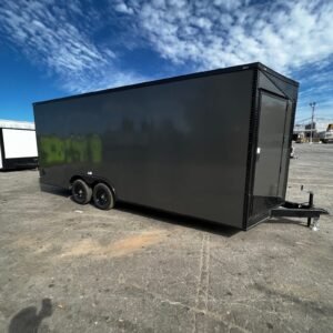 a black trailer with wheels