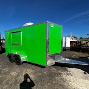 a green trailer with wheels