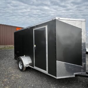 a black trailer with a door