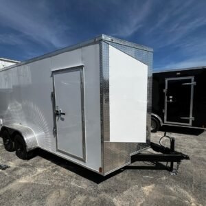 a white trailer with a door