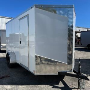 a white single axle trailer with a door